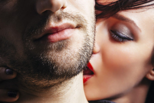 Woman Kissing Man On Neck 623x415 